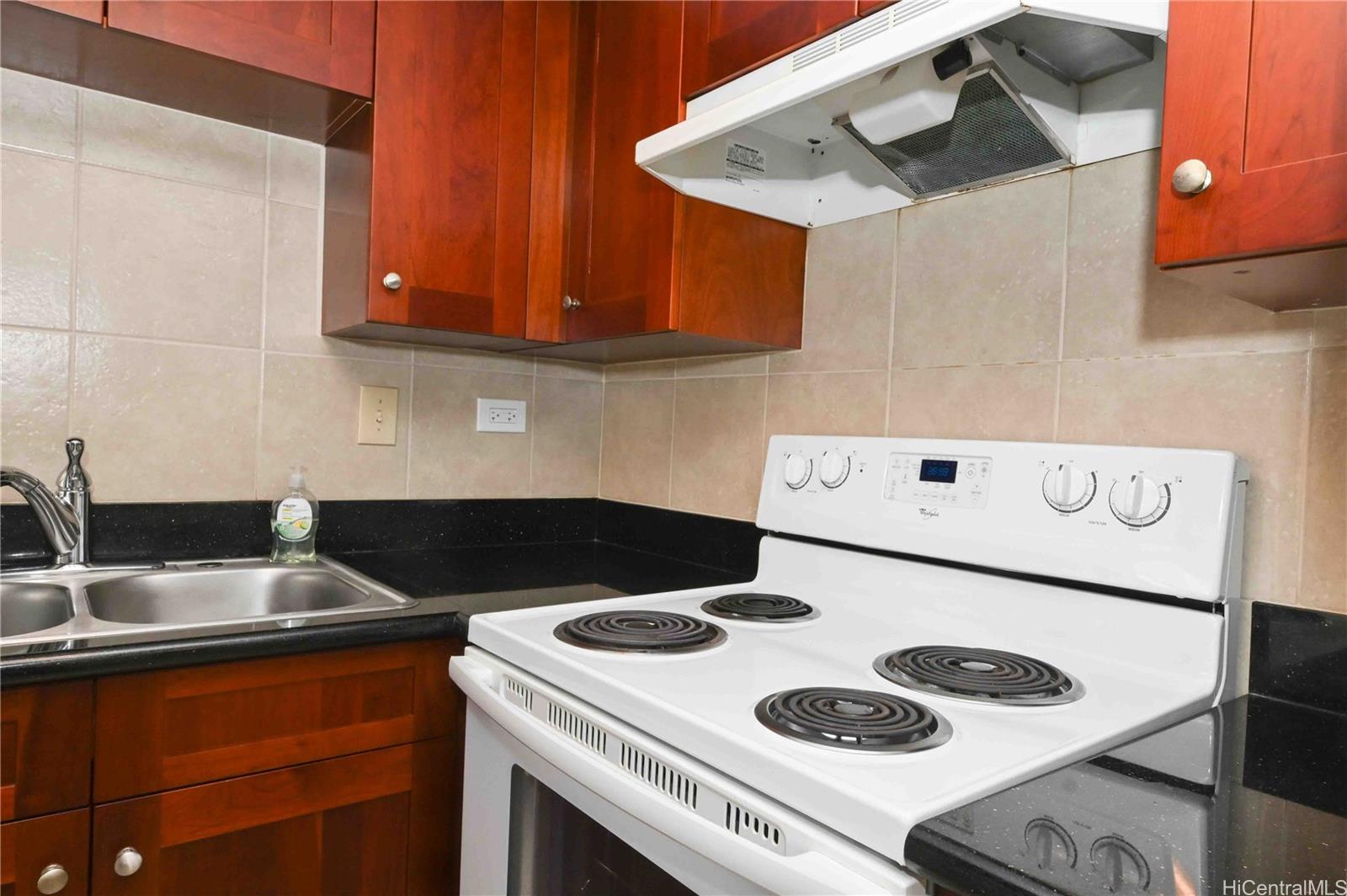 Iolani Court Plaza condo # 1404, Honolulu, Hawaii - photo 3 of 11