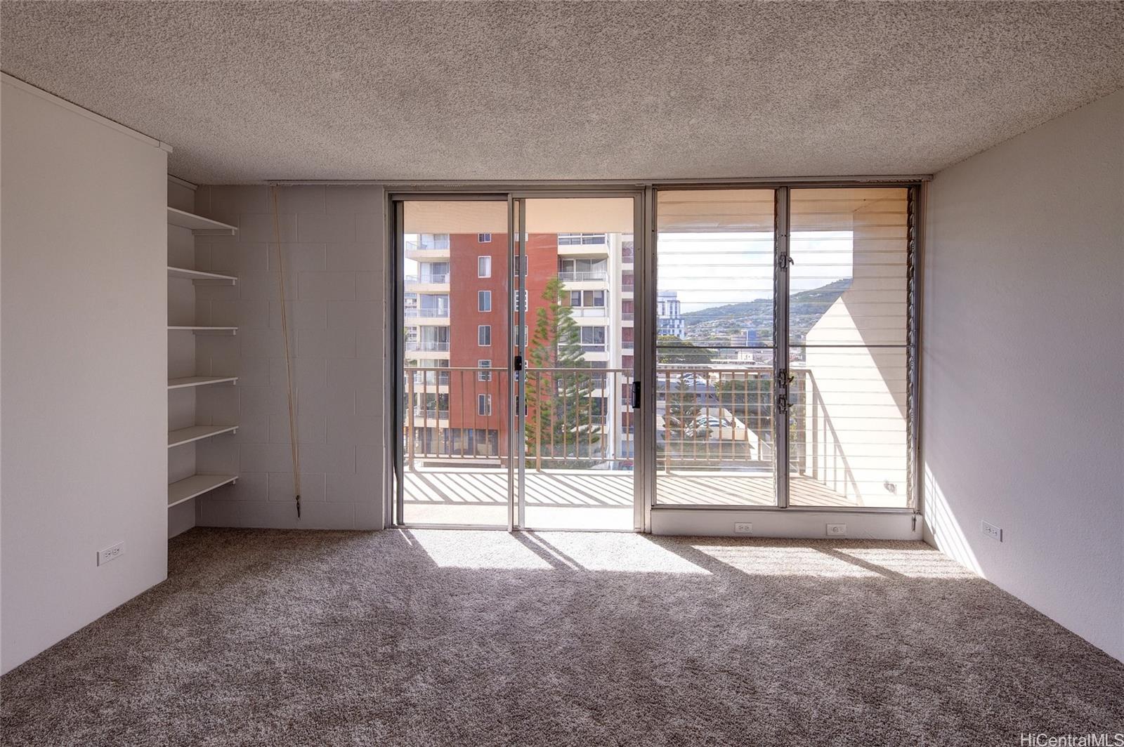 Rainbow Place condo # 702, Honolulu, Hawaii - photo 2 of 14