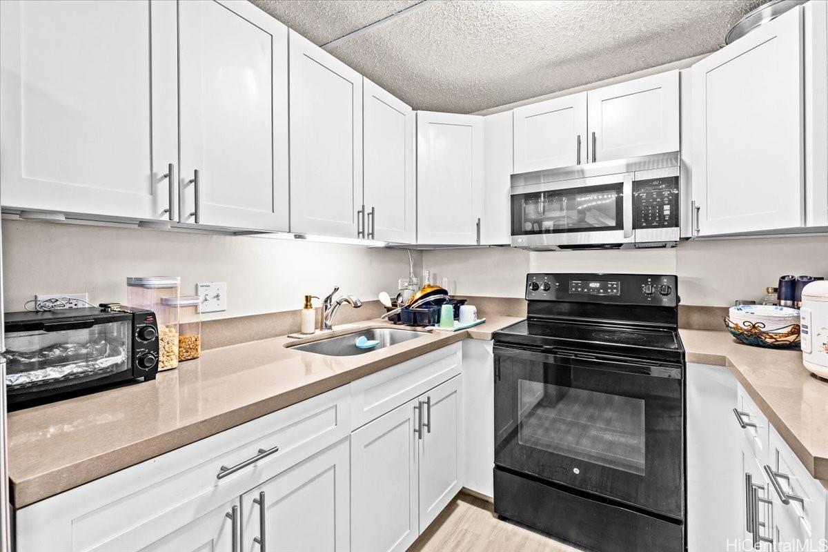 Sunset Lakeview condo # A102, Honolulu, Hawaii - photo 2 of 25